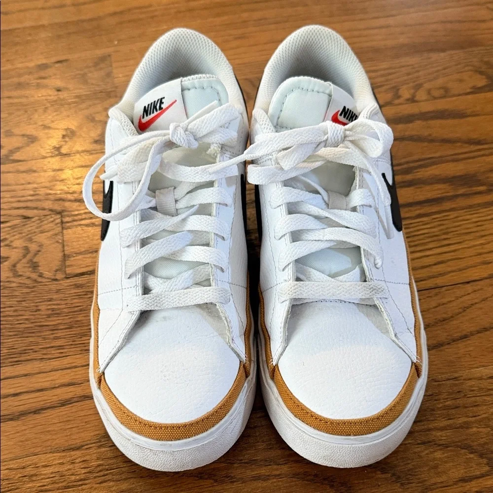 Nike Court Legacy White Low-Top Sneakers with Black Swoosh and Gold Accent